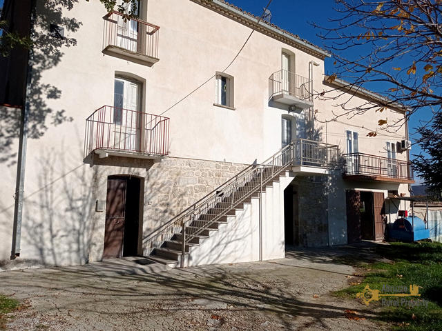Large four bedroom traditional country house with cellars, garage and one hectare of land, for sale in the Abruzzo region of Italy.