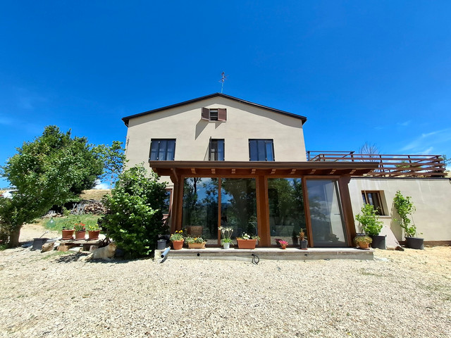 Restored country villa with 7 hectares of land with olive grove and woodland, for sale in Molise, Italy.