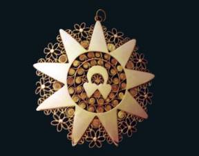 A jewellery in gold leaf and filigree work