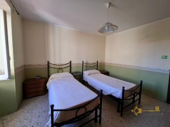 Four-bedroom traditional stone house with private garden. Agnone Img25