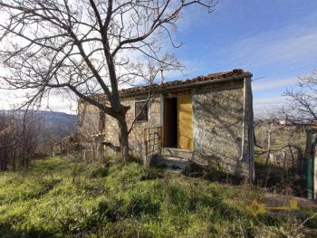 Ruin with land in the outskirt of Guilmi with mountain view for sale.