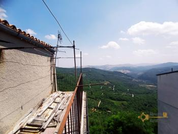 Large town house made of stone with terrace, near the coast. Img30