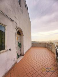 Two bedrooms town house with terrace and garden for sale near the coast.