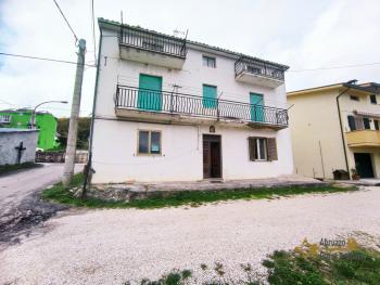 Perfect condition detached town house with two units for sale.