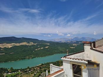 Recently restored two-bedroom town house with fantastic lake view terrace. Colledimezzo