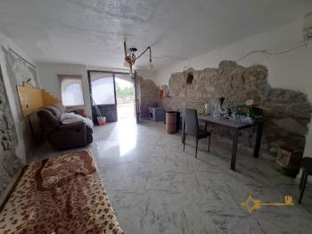 Character town house with panoramic terraced garden and versatile outbuilding with wooden veranda. Mafalda