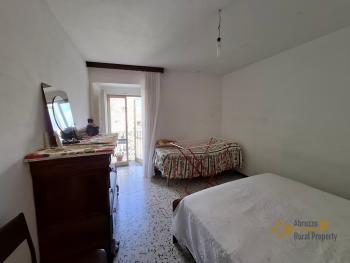 Two-bedroom stone house in habitable conditions with two cellars and outbuilding/garage. Guilmi Img21