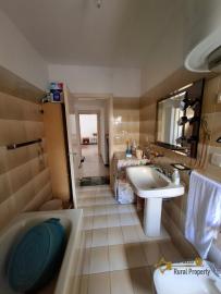 Two-bedroom stone house in habitable conditions with two cellars and outbuilding/garage. Guilmi Img18