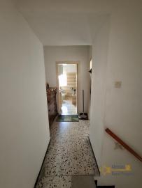 Two-bedroom stone house in habitable conditions with two cellars and outbuilding/garage. Guilmi Img15