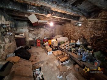 Two-bedroom stone house in habitable conditions with two cellars and outbuilding/garage. Guilmi Img26