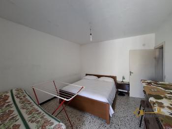 Two-bedroom stone house in habitable conditions with two cellars and outbuilding/garage. Guilmi Img19