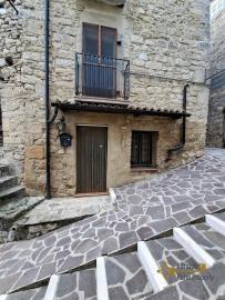 Traditional two-bedroom stone house with star-vaulted ceilings and panoramic balcony. Guilmi Img27