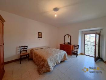 Traditional two-bedroom stone house with star-vaulted ceilings and panoramic balcony. Guilmi Img16