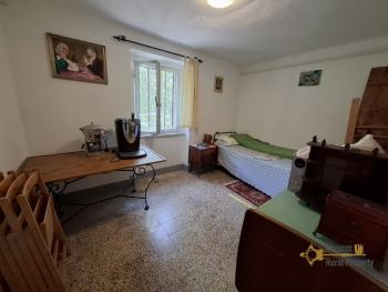 Traditional stone country house in a private woodland setting with 13,000 sqm of land. Castiglione Messer Marino Img14