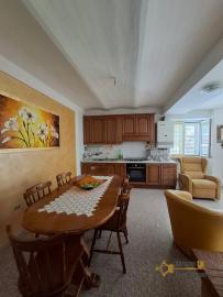 Spacious three-bedrooms town house with guest unit and sea view. Tavenna Img18