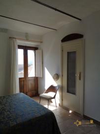 Completely restored stone house with small garden for sale. Img23