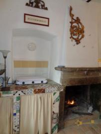 Completely restored stone house with small garden for sale. Img25