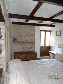 Completely restored stone house with small garden for sale. Img11